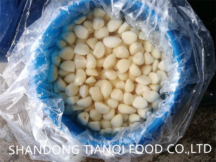 New crop peeled white garlic in salted water M size